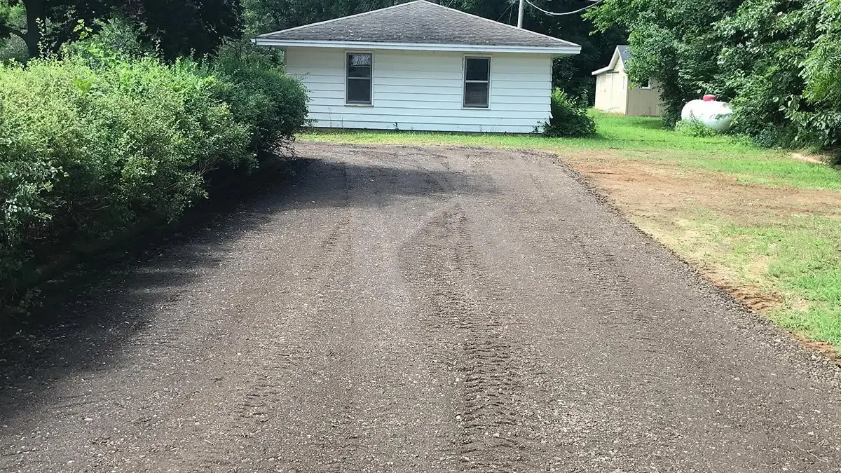 Existing gravel driveway being resurfaced