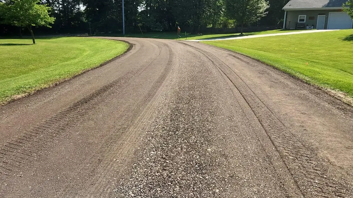 New gravel driveway being constructed on residential property