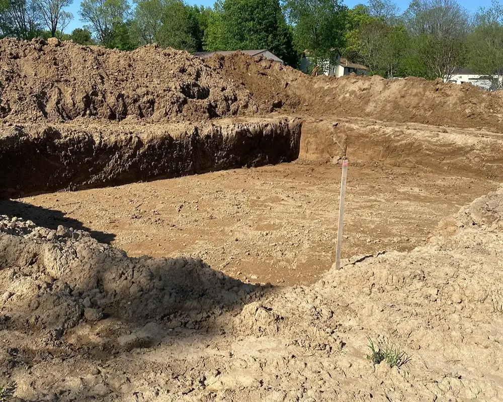 Basement excavation project in Hastings Michigan by R&H Tractor Services