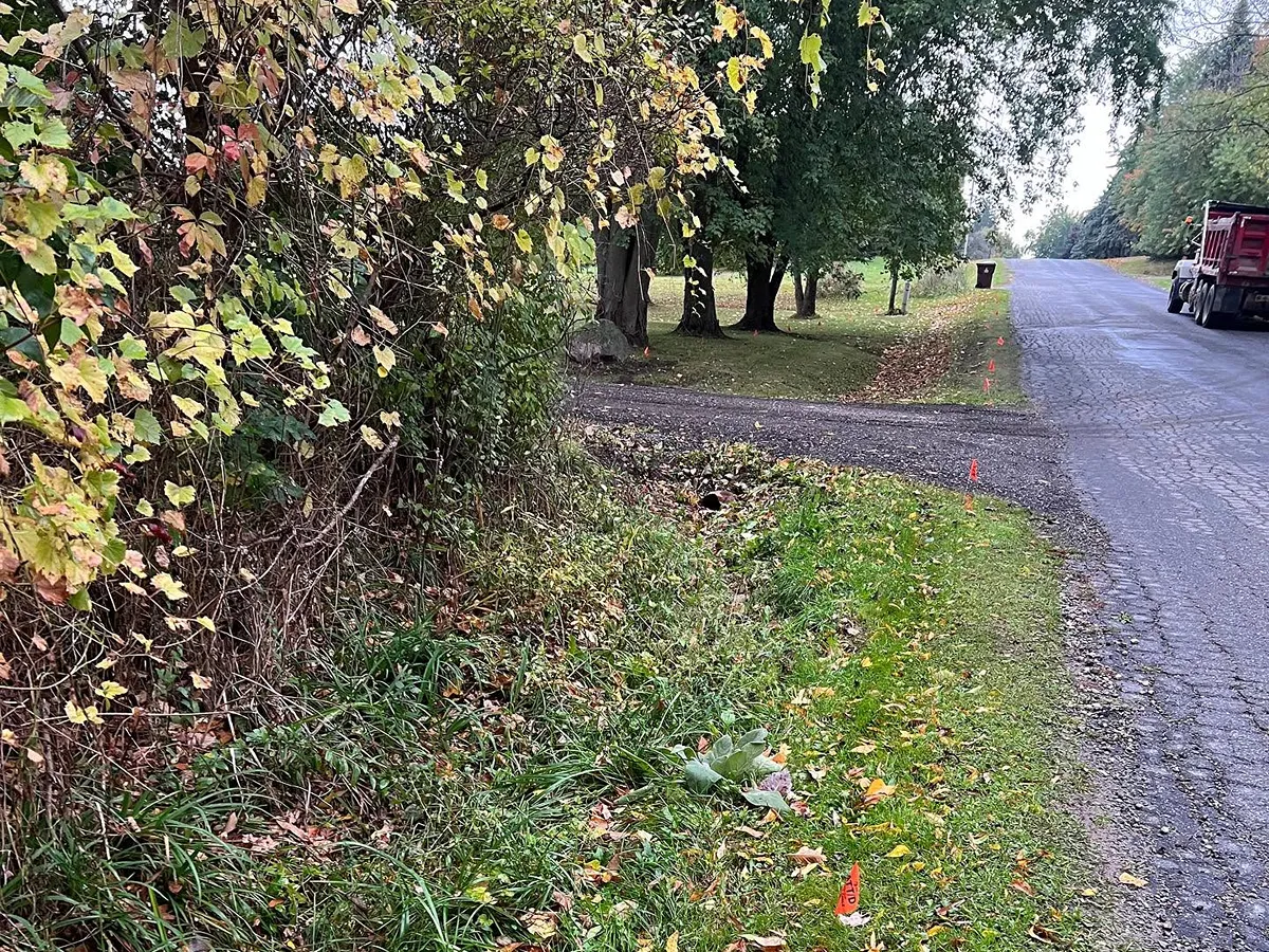 Driveway drainage ditch before culvert and drainage improvements