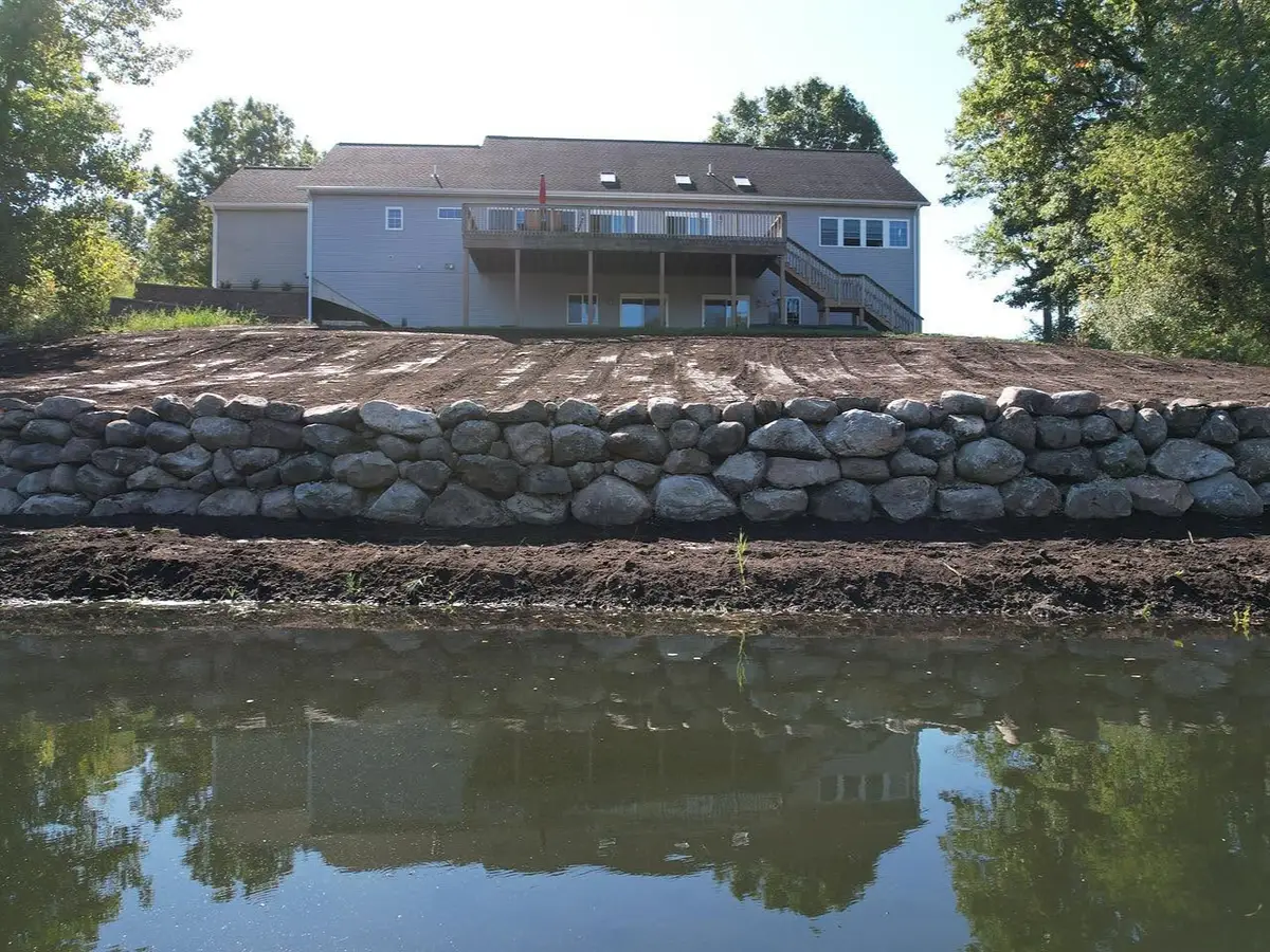 Natural boulder seawall on a West Michigan lakefront property