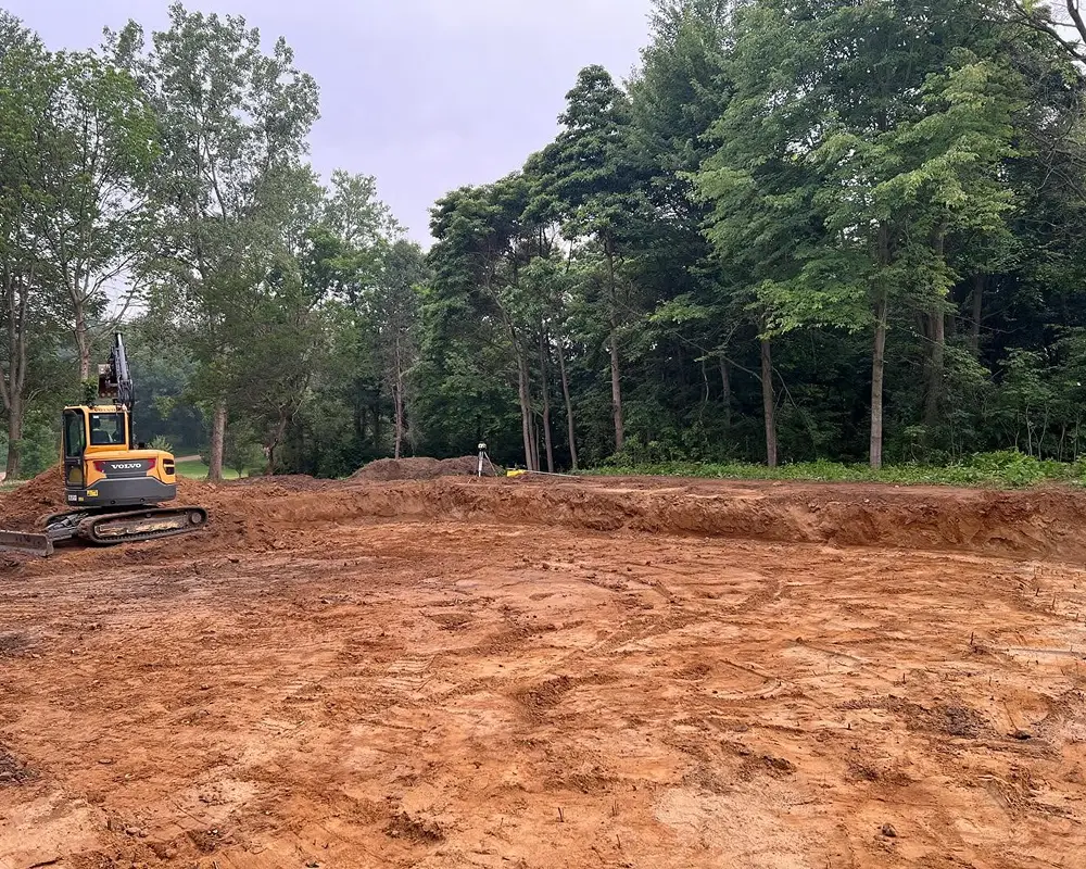 Crawl space excavation for new lodge construction at Camp Michawana