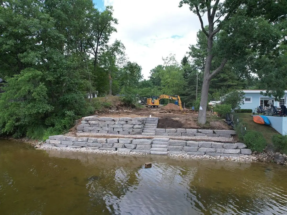 Stone seawall installed to protect a shoreline from erosion