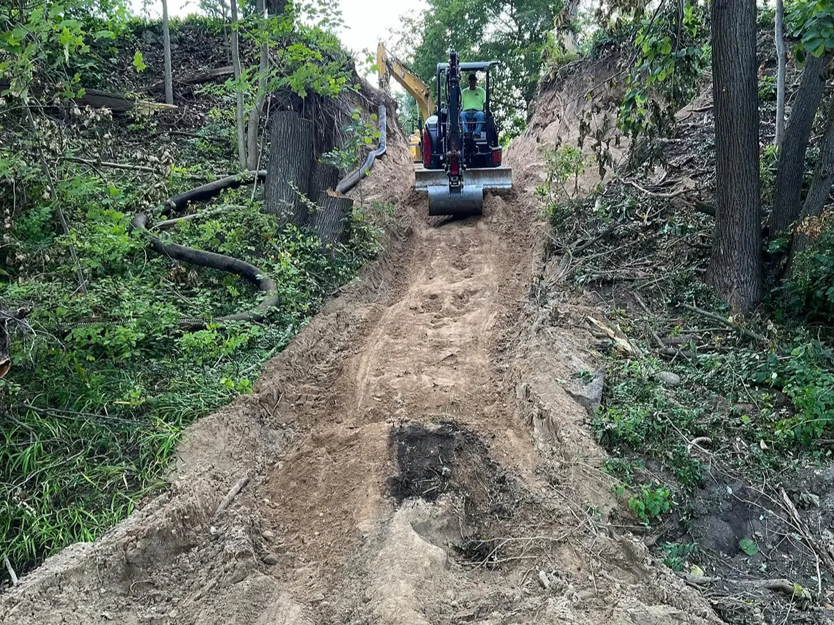 Heavy equipment working on the Thornapple River stabilization project